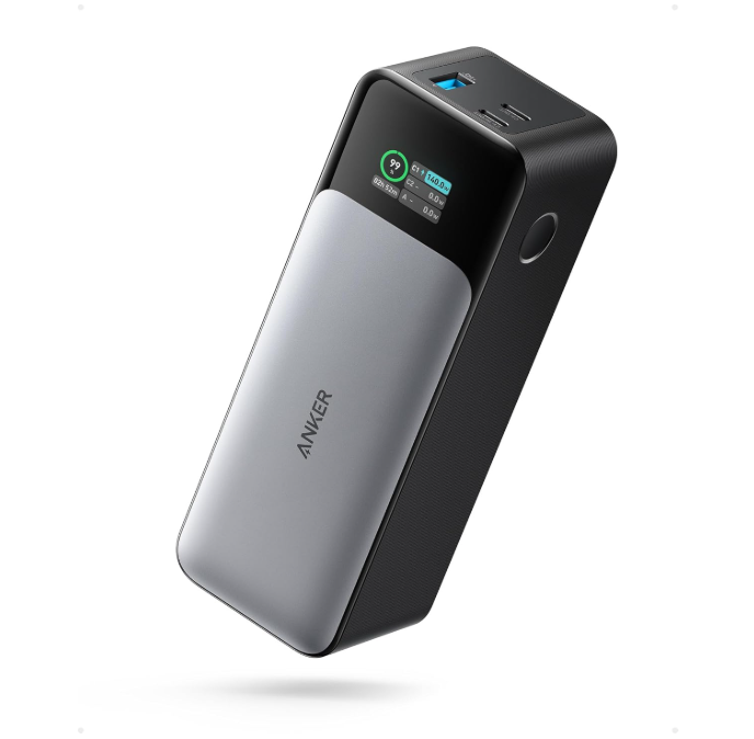 High-capacity portable power bank with built-in display and charging cable.